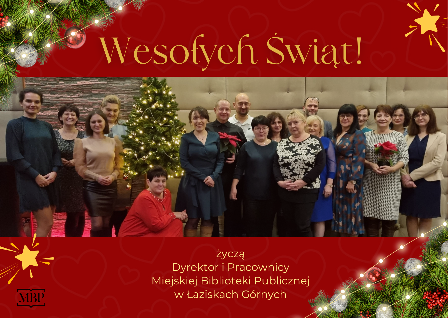 Kartka świąteczna ze zdjęciem pracowników biblioteki
